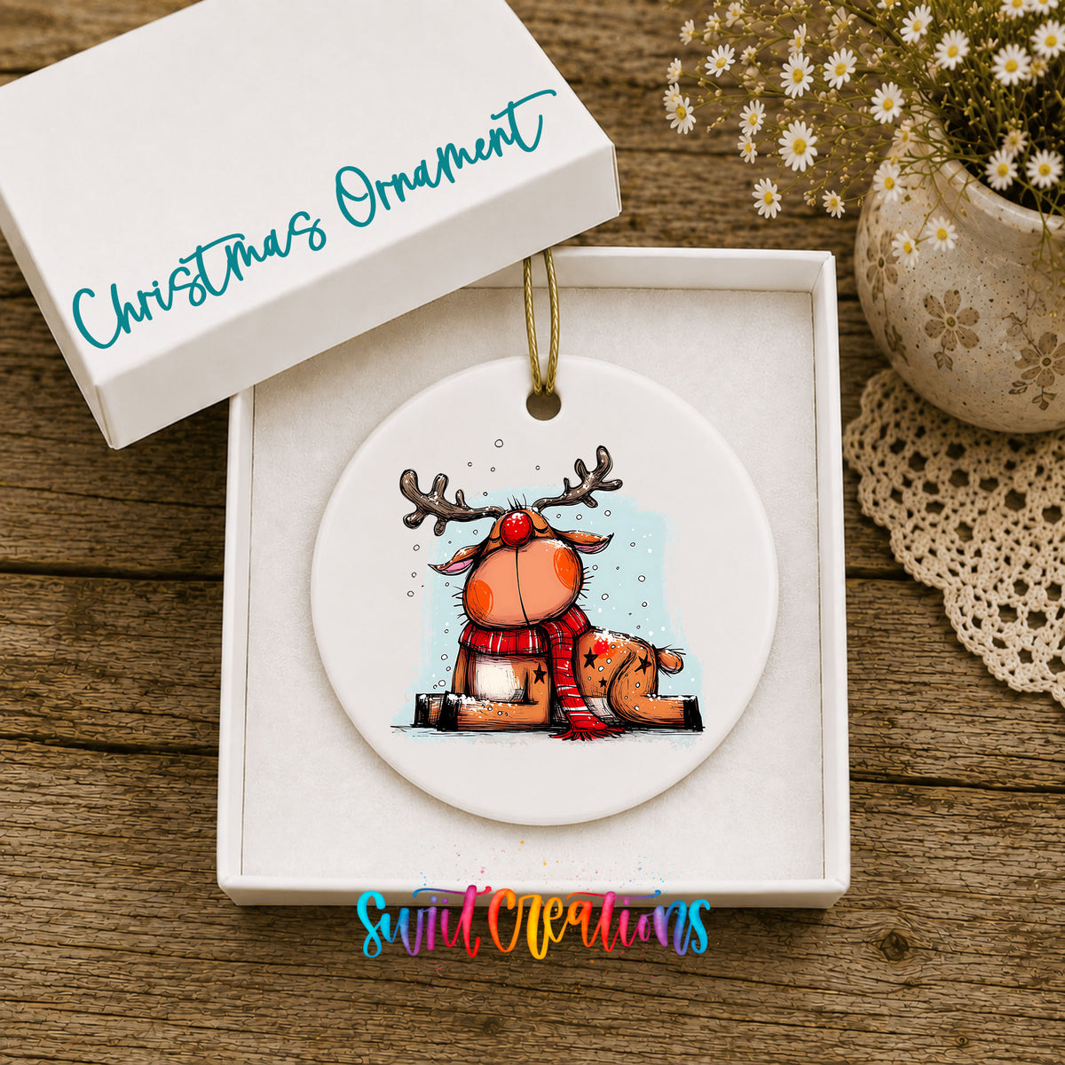 Santa and Reindeer with Gift Sack Christmas ornament displayed in an included gift box