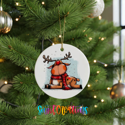 Santa and Reindeer with Gift Sack Christmas ornament hanging on a green Christmas tree