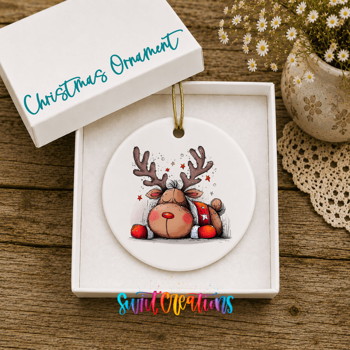 Cute Reindeer with Red Gift Bag Christmas ornament displayed in an included gift box
