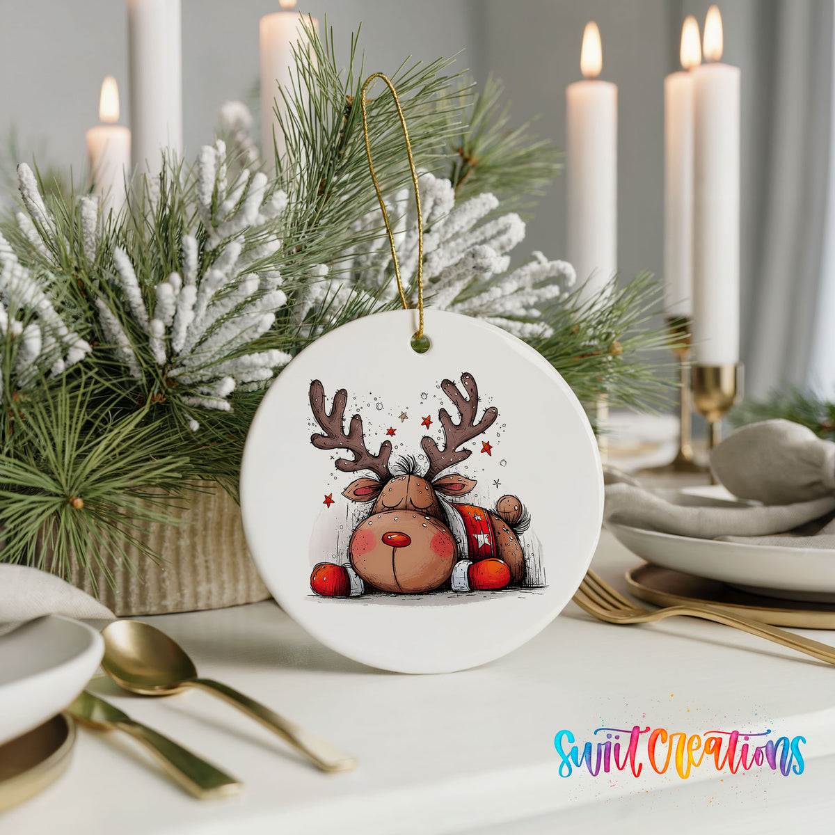 Cute Reindeer with Red Gift Bag Christmas ornament styled with elegant holiday table decor