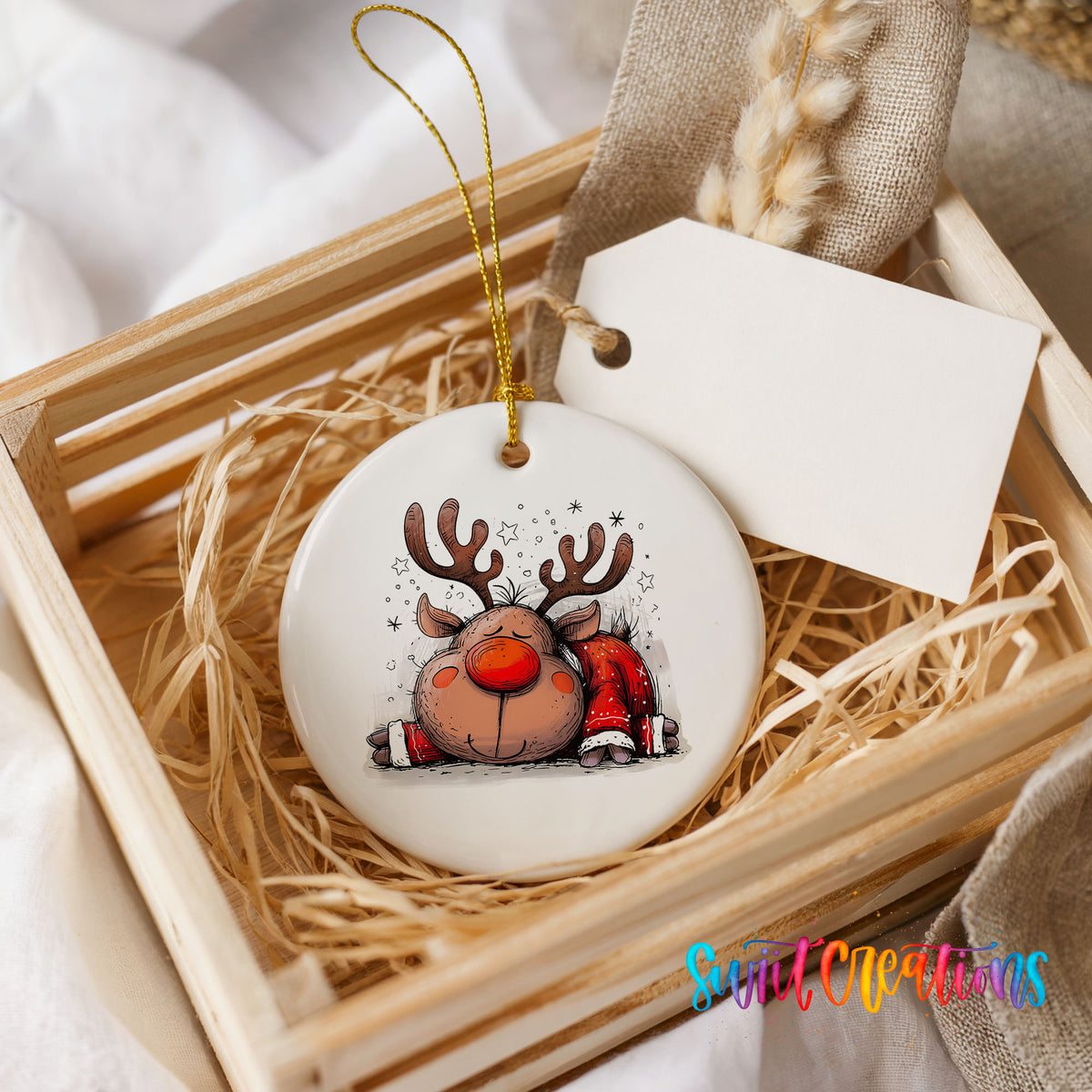 Sleeping Reindeer in Red Scarf Christmas ornament presented in a rustic wooden gift crate