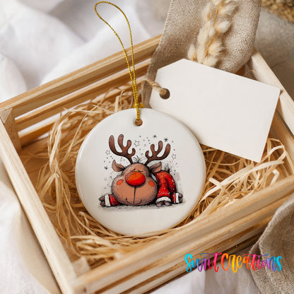 Sleeping Reindeer in Red Scarf Christmas ornament presented in a rustic wooden gift crate