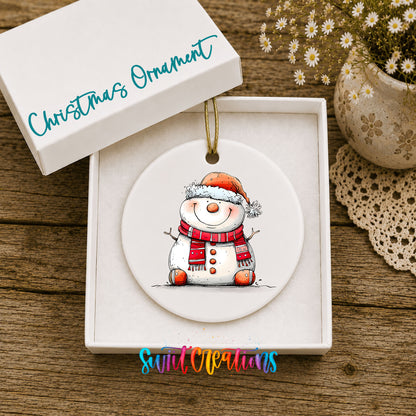 Cheerful Snowman in Santa Hat Christmas ornament displayed in an included gift box