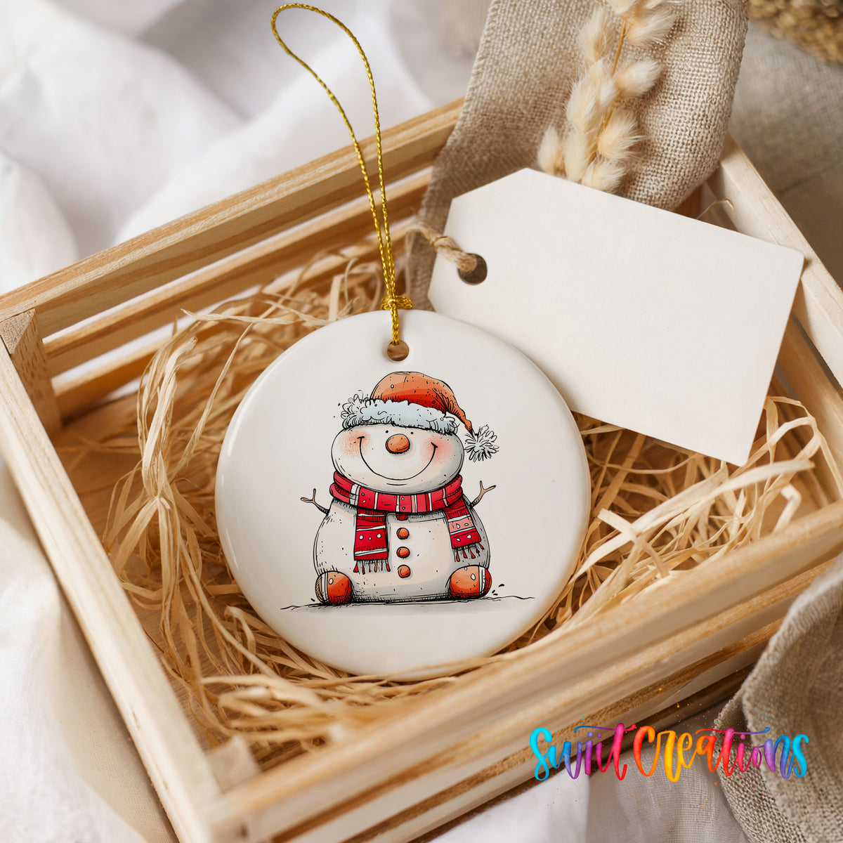 Cheerful Snowman in Santa Hat Christmas ornament presented in a rustic wooden gift crate