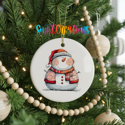 Snowman Couple in Red Santa Hats Christmas ornament hanging on a decorated Christmas tree
