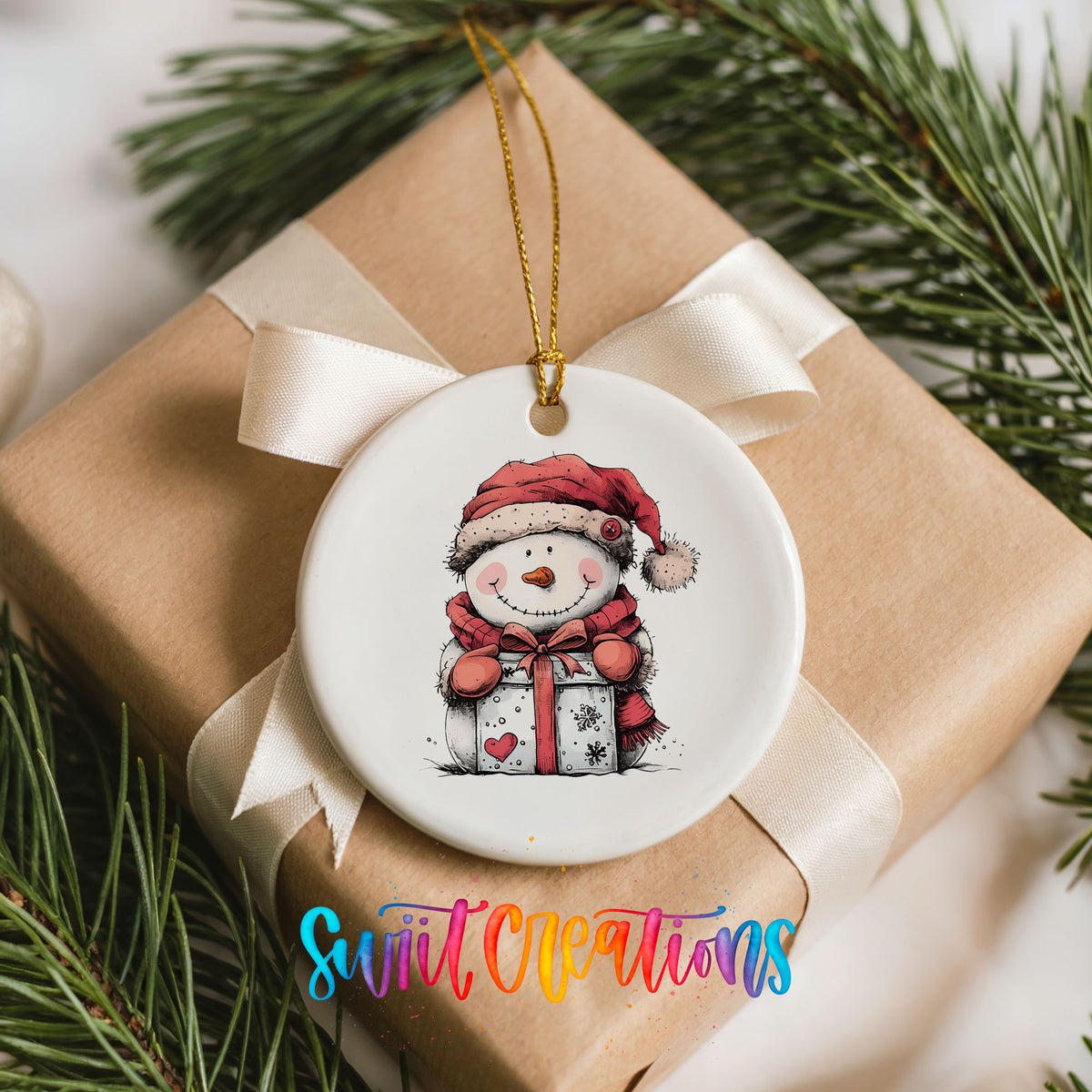 Snowman with Wrapped Christmas Gift Christmas ornament placed on a wrapped Christmas gift