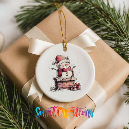 Snowman Beside a Holiday Mailbox Christmas ornament placed on a wrapped Christmas gift