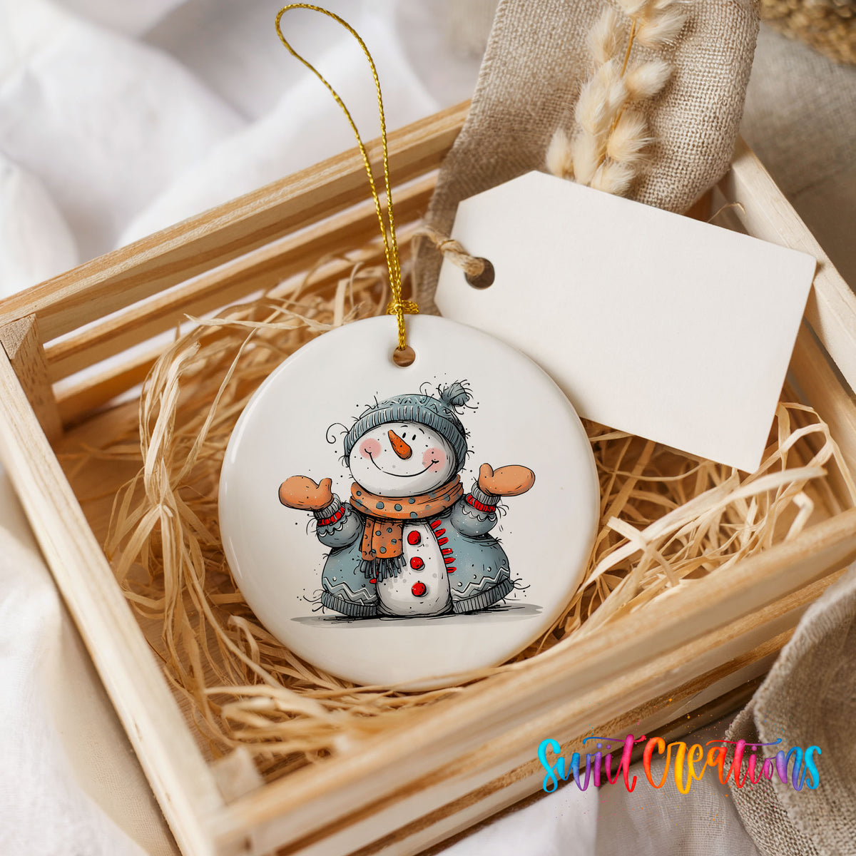 Happy Snowman in Blue Scarf Christmas ornament presented in a rustic wooden gift crate