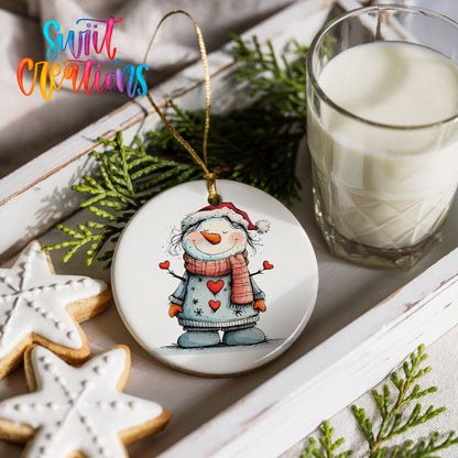 Snowman in Gray Coat and Red Scarf Christmas ornament styled with cookies and milk