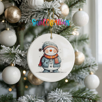 Smiling Snowman in Blue Winter Hat Christmas ornament hanging on a frosted holiday tree