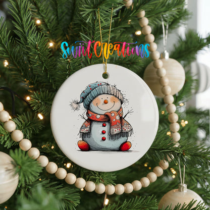 Snowman in Red Hat and Blue Scarf Christmas ornament hanging on a decorated Christmas tree