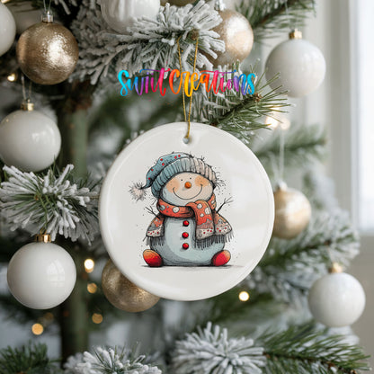 Snowman in Red Hat and Blue Scarf Christmas ornament hanging on a frosted holiday tree