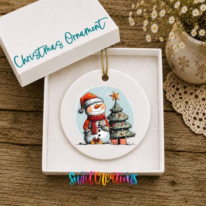 Snowman Beside a Christmas Tree Christmas ornament displayed in an included gift box