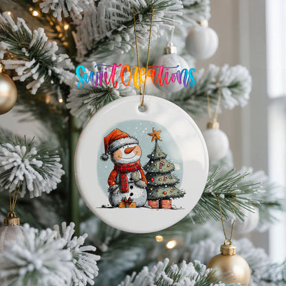Snowman Beside a Christmas Tree Christmas ornament hanging on a frosted Christmas tree