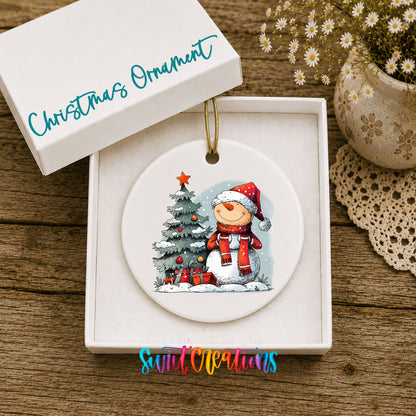 Santa Decorating a Christmas Tree Christmas ornament displayed in an included gift box