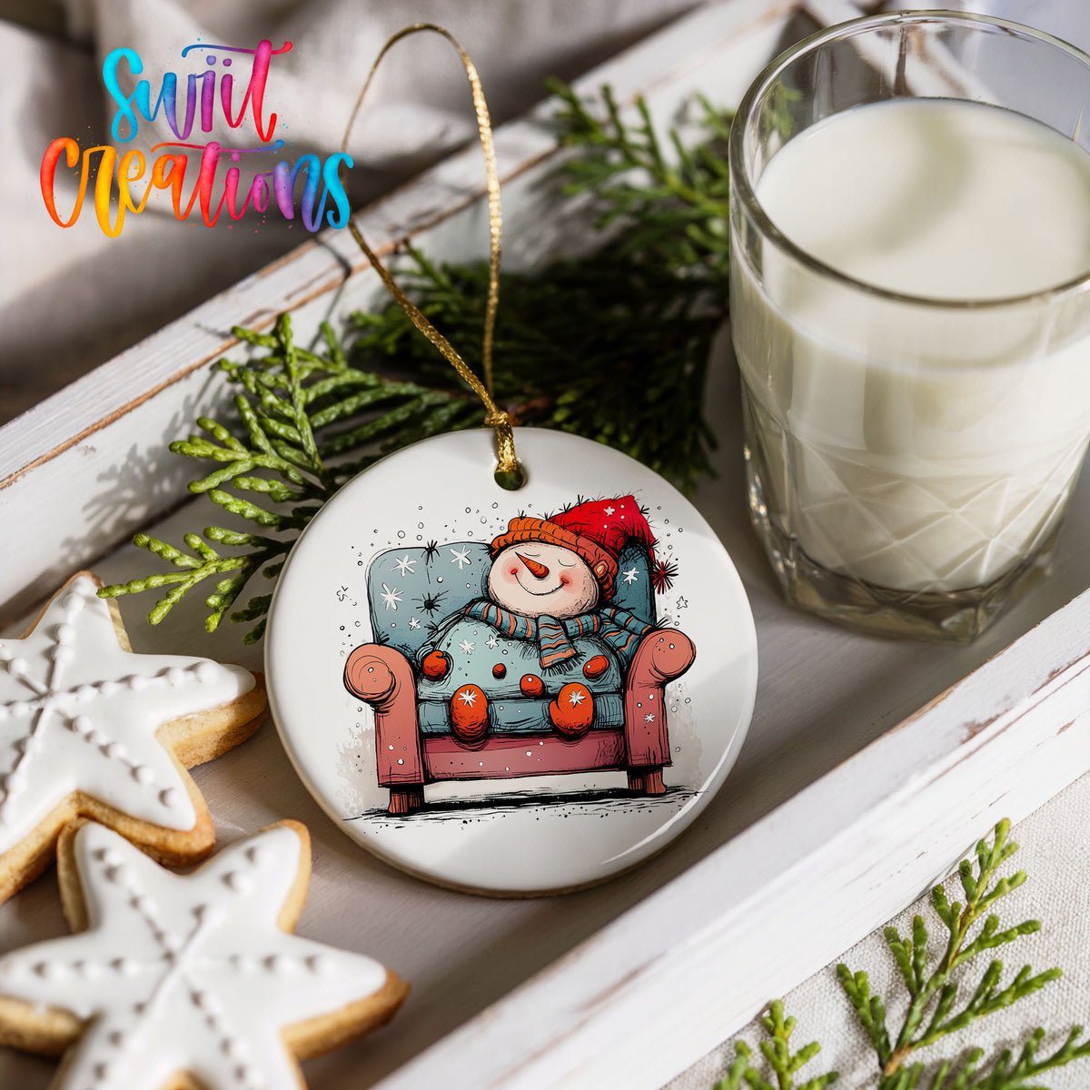Santa Resting in a Holiday Armchair Christmas ornament styled with cookies and milk