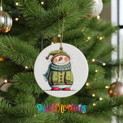 Snowman in Green Winter Coat Christmas ornament hanging on a green Christmas tree