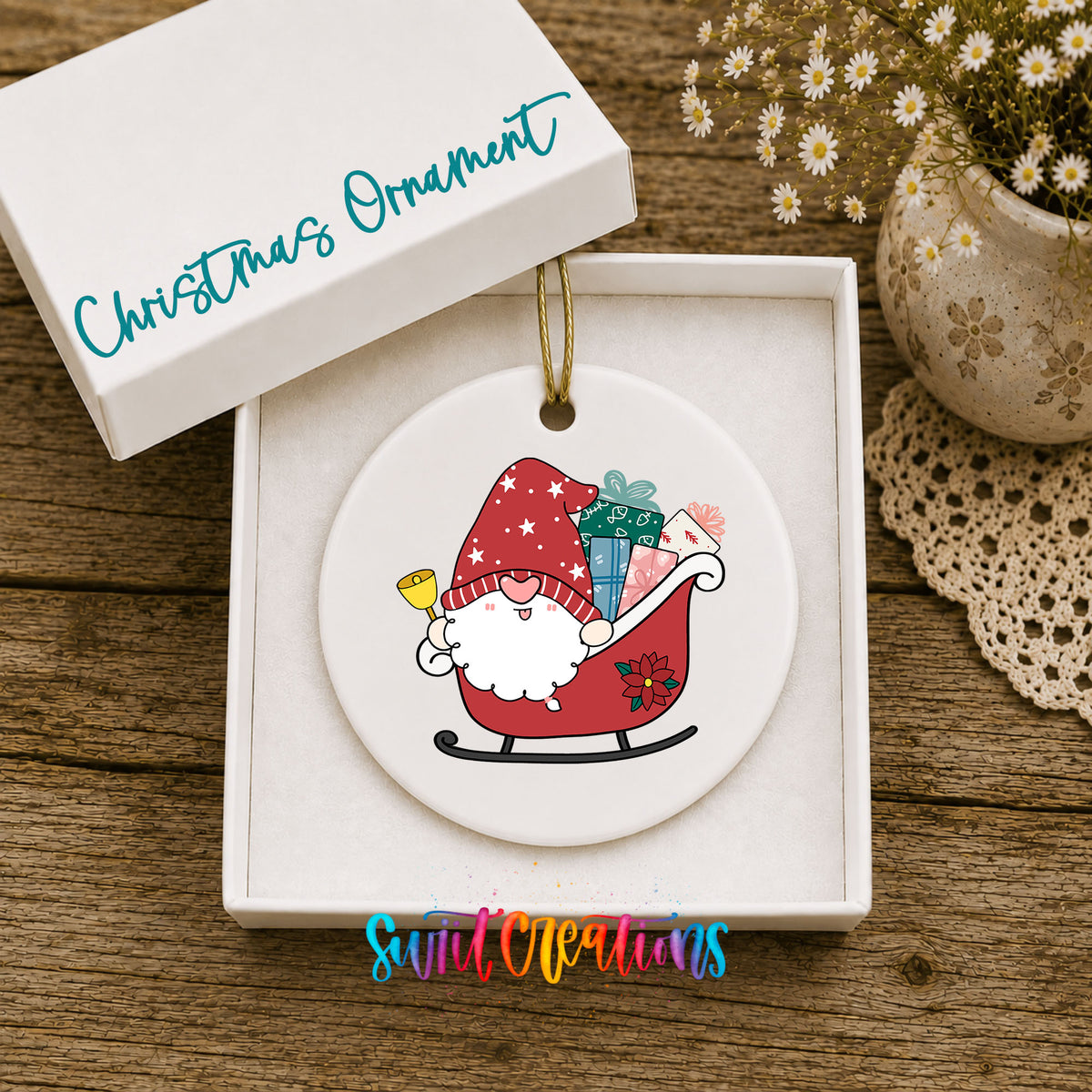 Santa Gnome ceramic Christmas ornament displayed in gift box