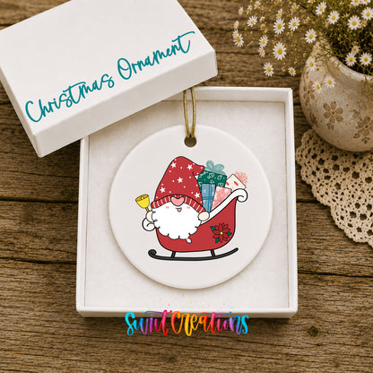 Santa Gnome ceramic Christmas ornament displayed in gift box