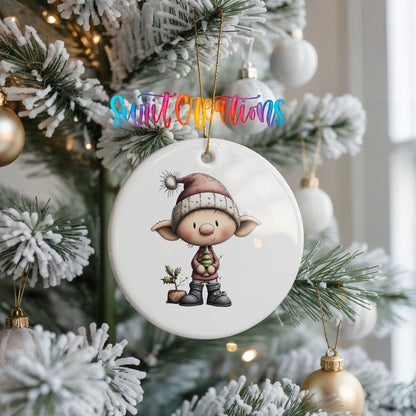 Whimsical Boy Elf in Santa Hat ceramic Christmas ornament holiday product view