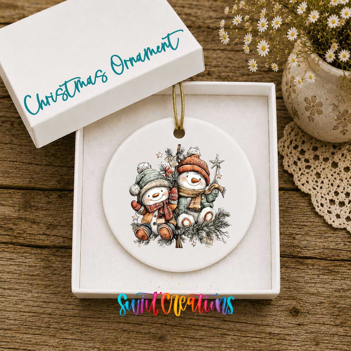 Snowman Friends in Cozy Scarves ceramic Christmas ornament displayed in gift box