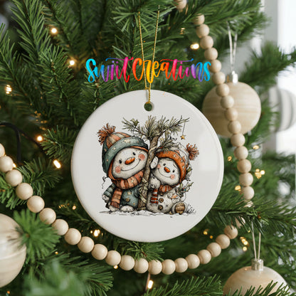 Snowman Couple Under Winter Pine ceramic Christmas ornament holiday product view