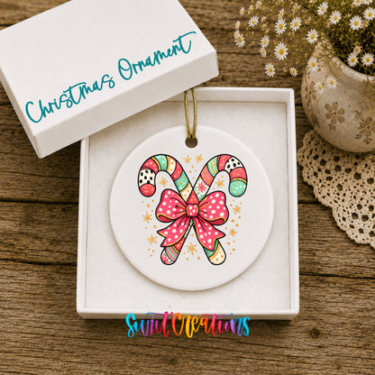 Candy Canes with Pink Bow ceramic Christmas ornament displayed in gift box