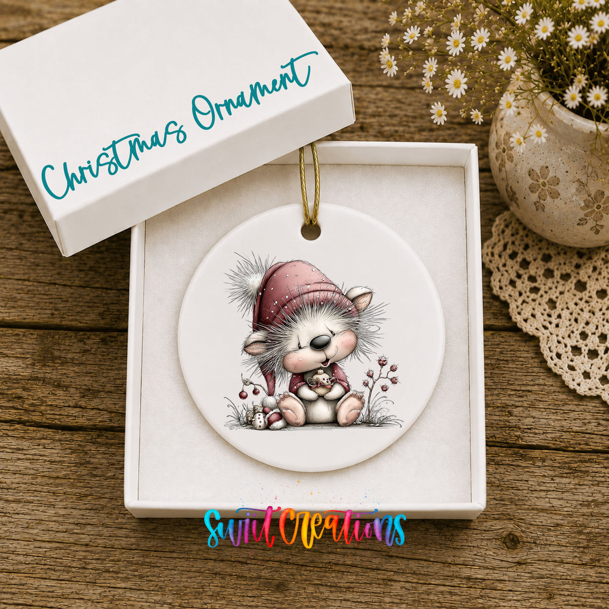pink and gray kitten in a winter hat and scarf ceramic Christmas ornament presented in a gift box
