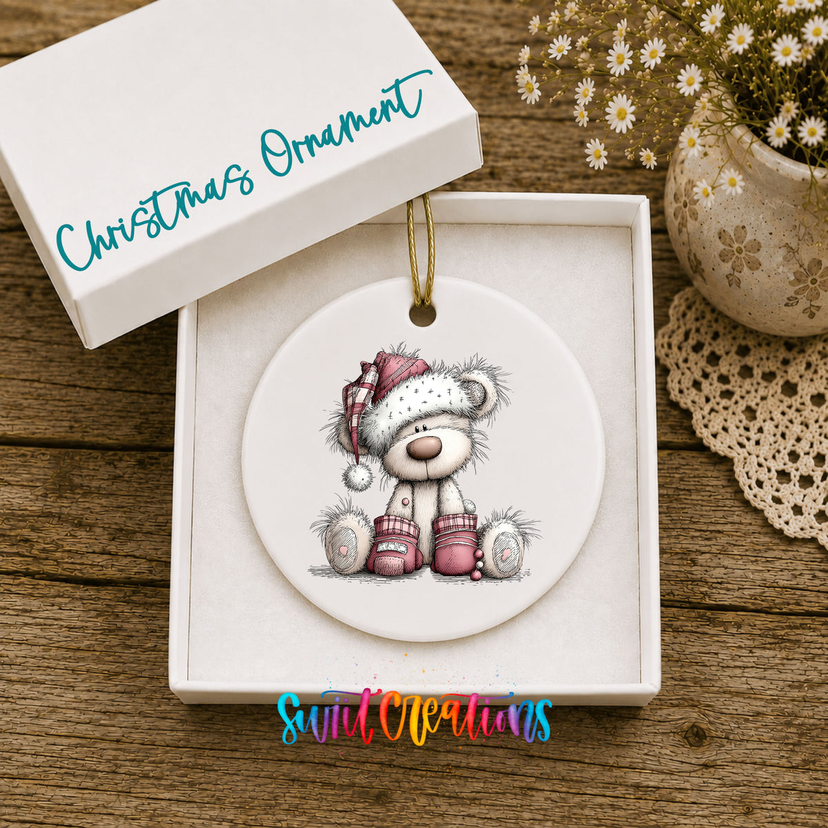 teddy bear in a Santa hat with Christmas gifts ceramic Christmas ornament presented in a gift box