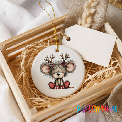 Christmas mouse wearing reindeer antlers and a red scarf ceramic Christmas ornament displayed in a wooden gift crate