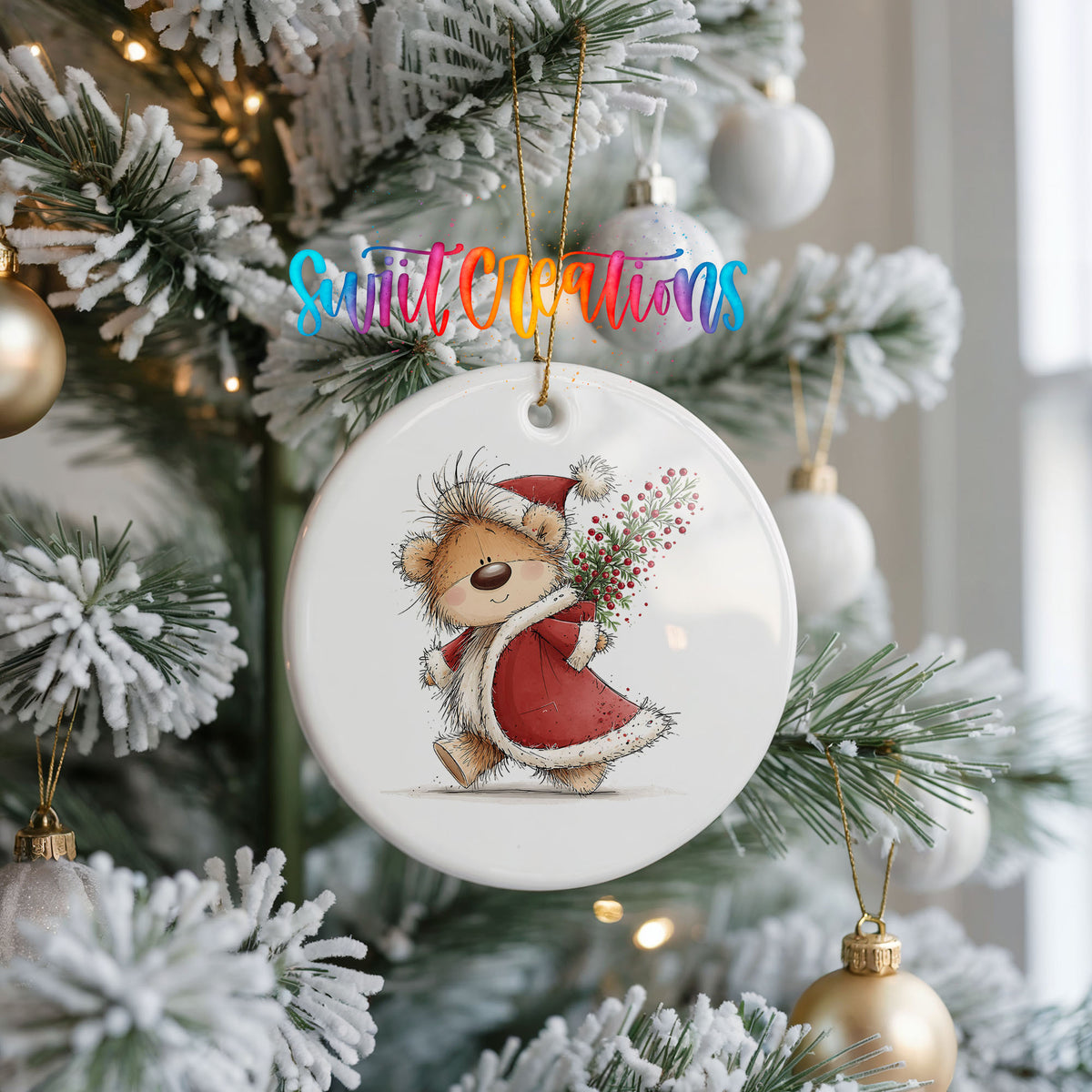 teddy bear carrying a red Christmas sack with winter greenery ceramic Christmas ornament hanging on a frosted Christmas tree