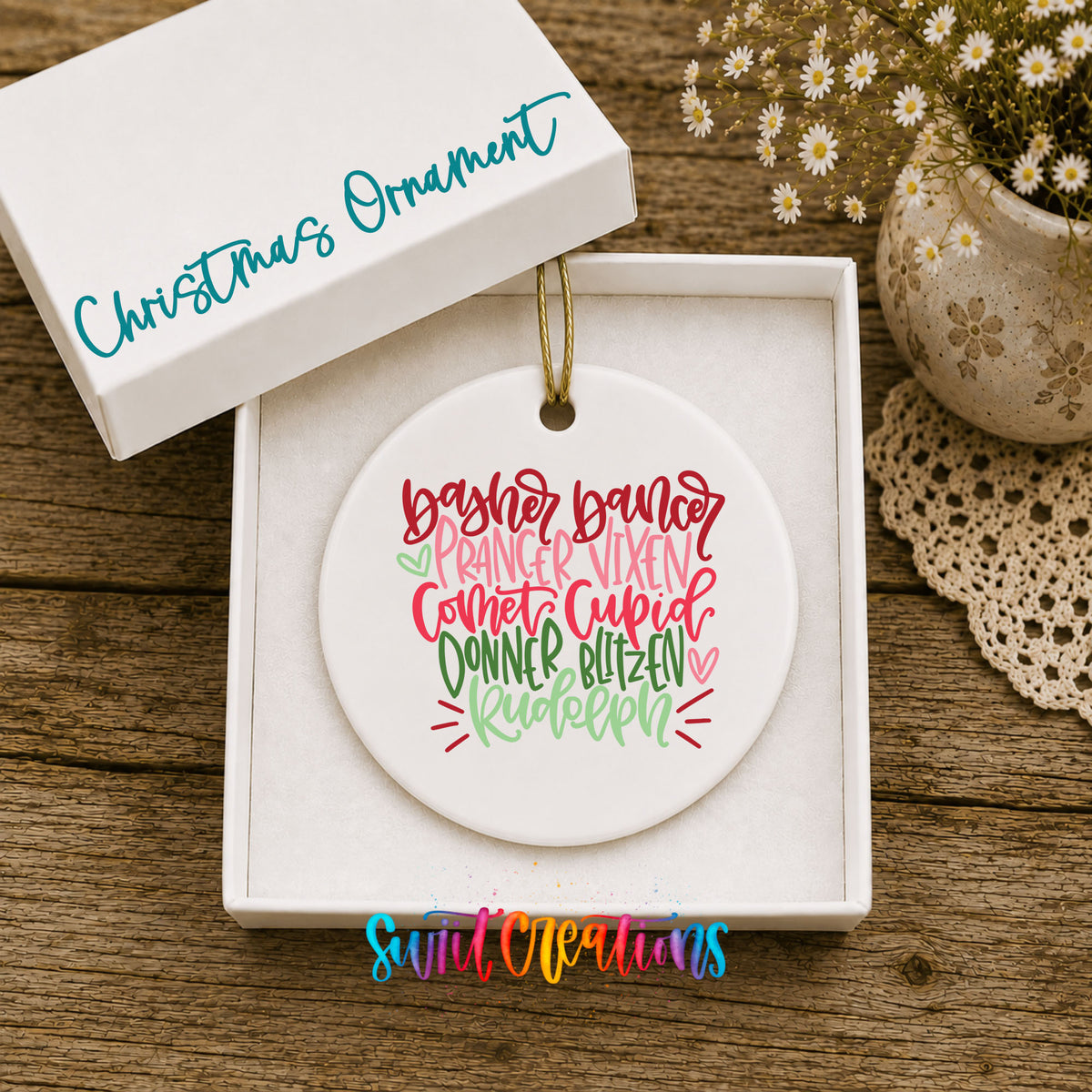 Colorful reindeer names typography ceramic Christmas ornament displayed in the included gift box