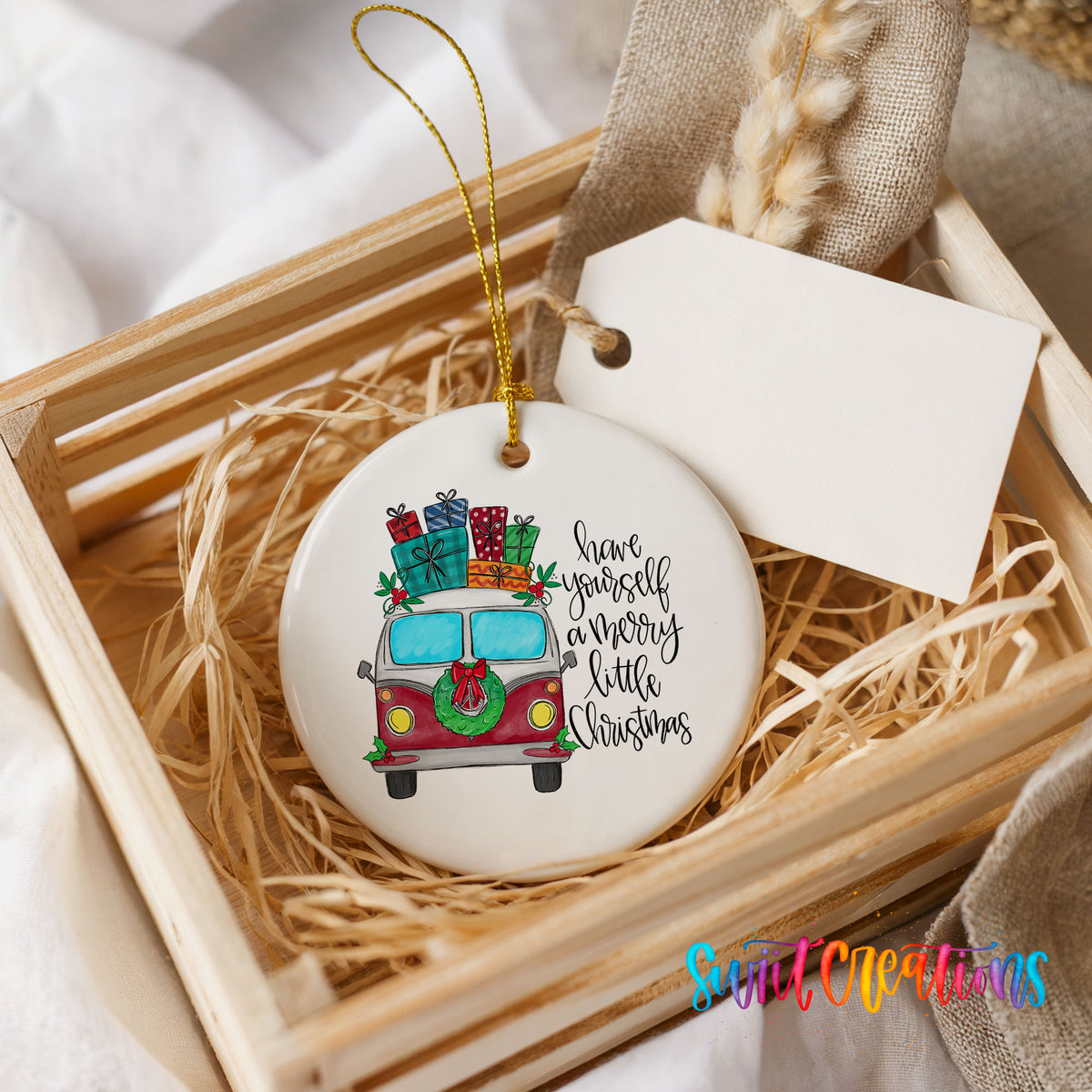 Have Yourself a Merry Little Christmas vintage truck ceramic Christmas ornament displayed in a rustic wooden gift crate