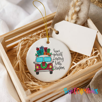 Have Yourself a Merry Little Christmas vintage truck ceramic Christmas ornament displayed in a rustic wooden gift crate