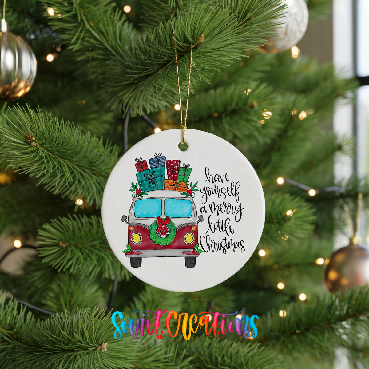 Have Yourself a Merry Little Christmas vintage truck ceramic Christmas ornament hanging on a green Christmas tree
