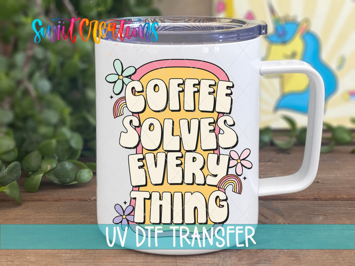Coffee Solves Everything UV DTF transfer displayed on a white coffee mug from Swiit Creations