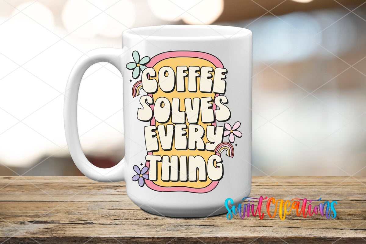 Coffee Solves Everything UV DTF transfer displayed on a white ceramic mug from Swiit Creations