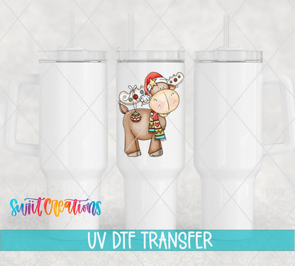 Three white tumblers featuring the Cute Christmas Moose UV DTF transfer by Swiit Creations