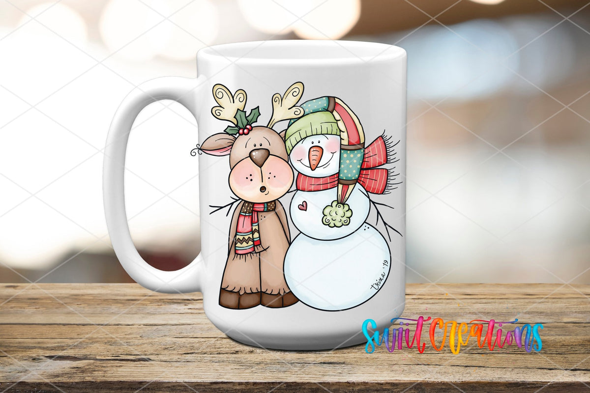 White ceramic mug with the Swiit Creations Reindeer and Snowman Christmas UV DTF transfer