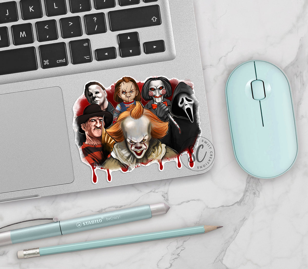 a laptop with a sticker of a group of people on it