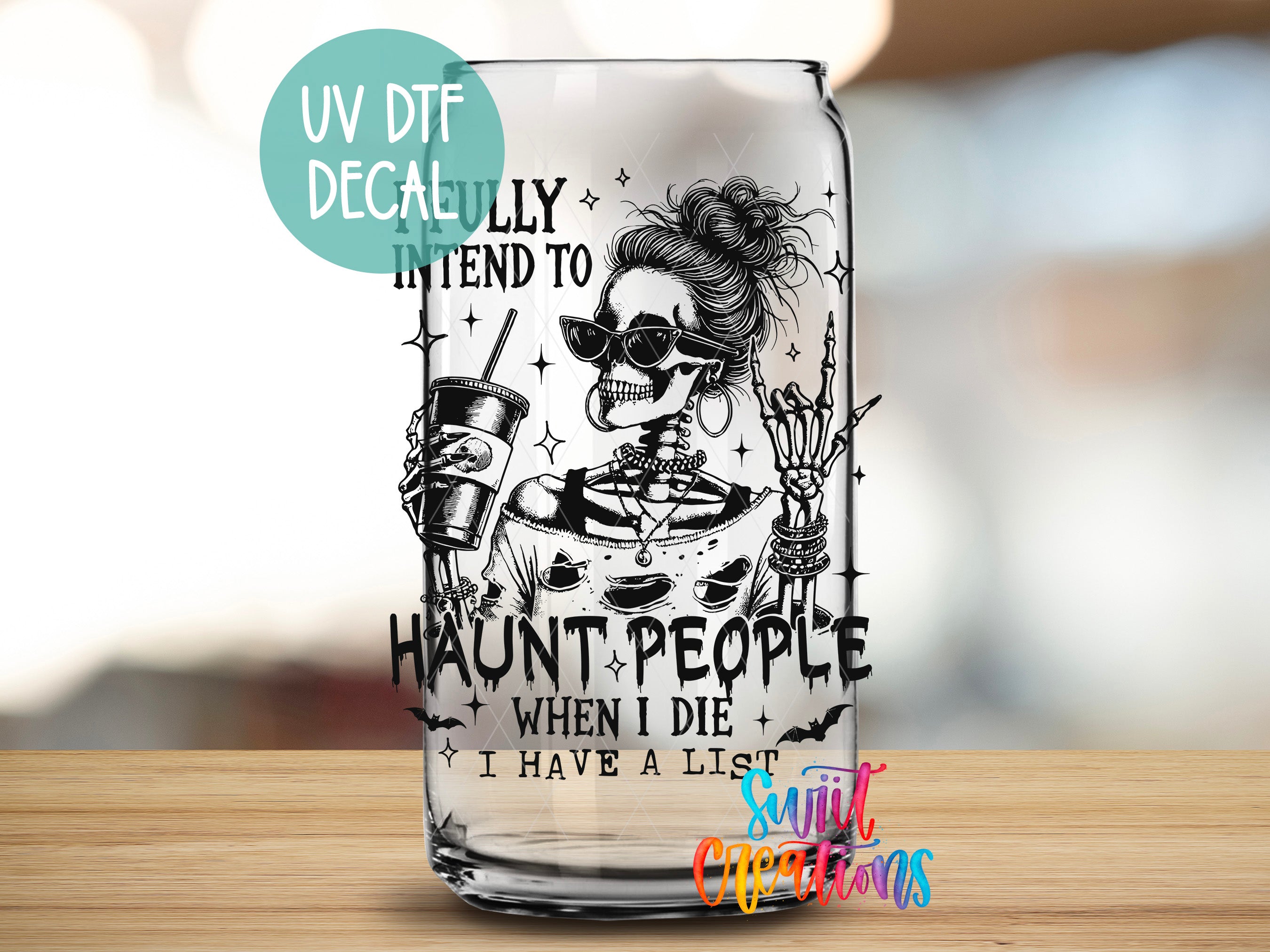A glass with a black and white illustration of a skeleton wearing sunglasses and holding a drink, along with text that says "HAUNT.PEOPLE WHEN I DIE I HAVE A LIST".