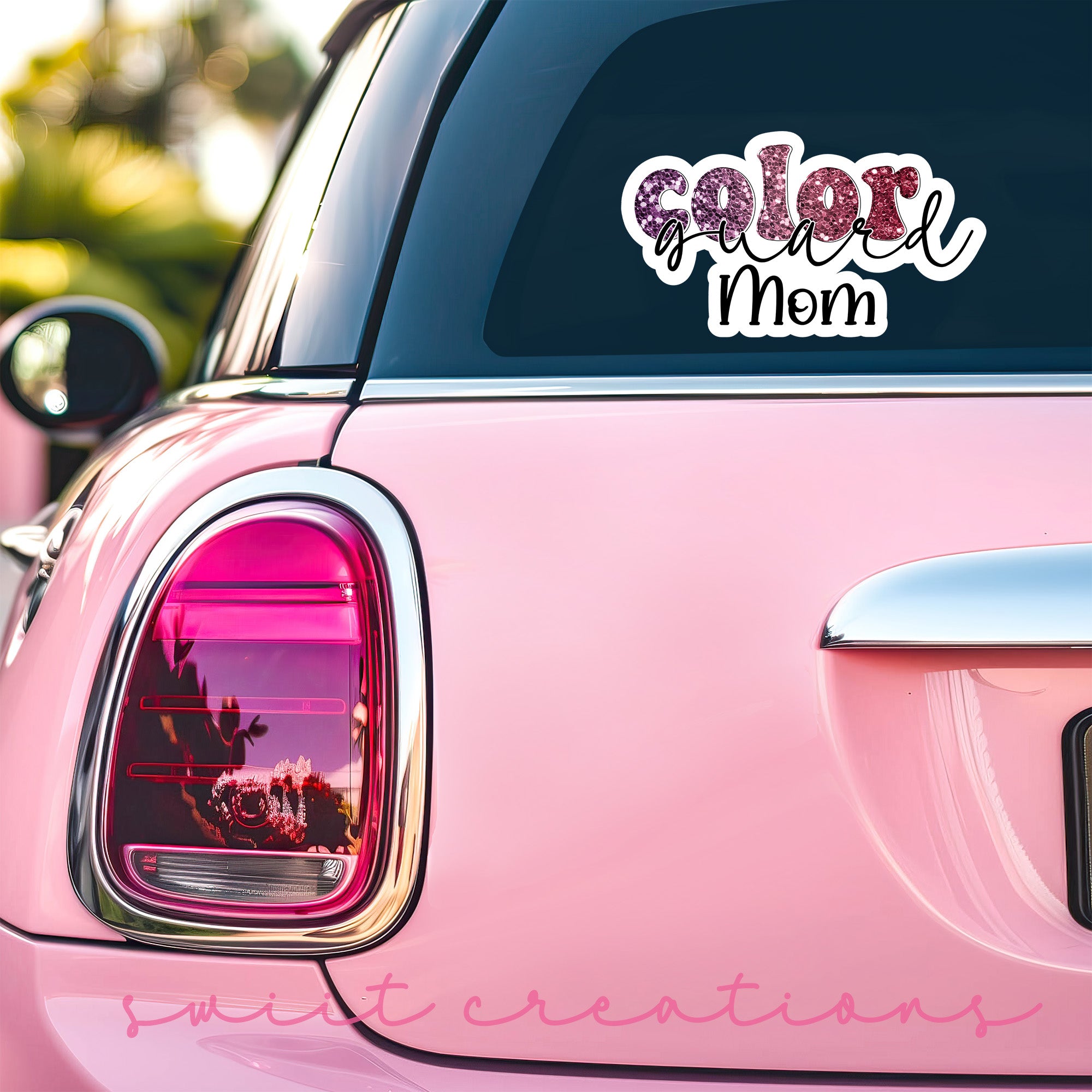 a pink car with the word color mem on it