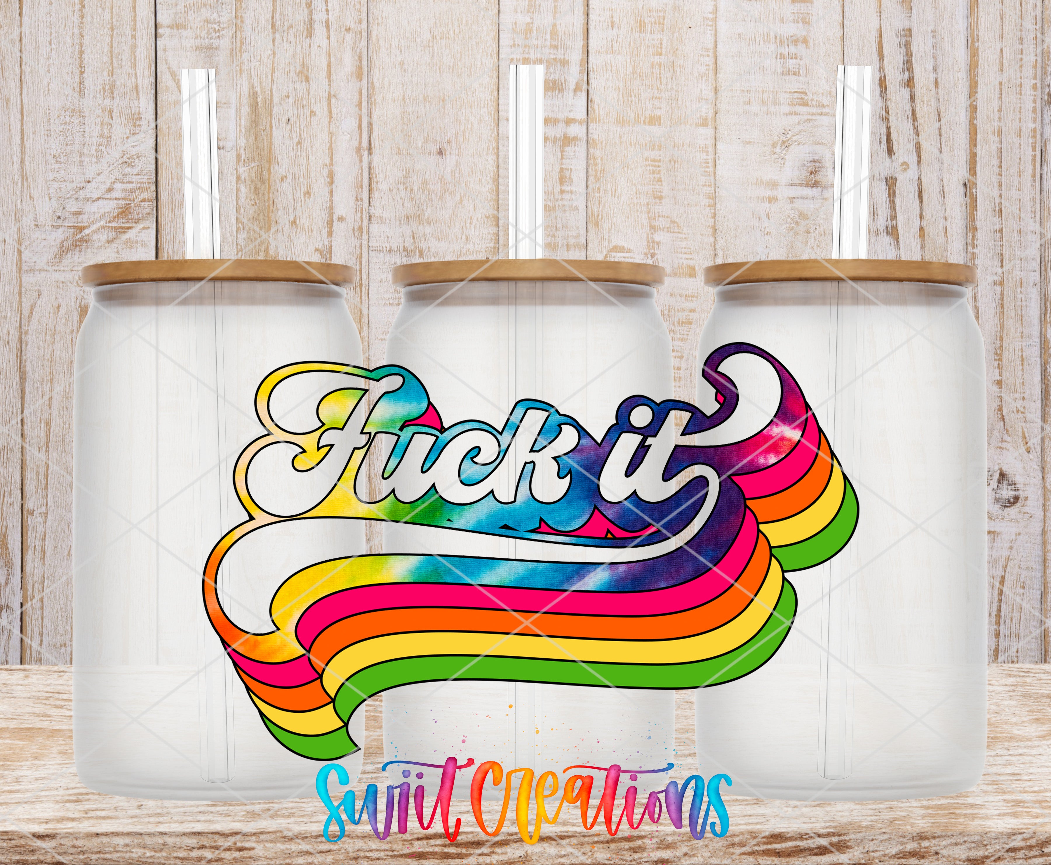 three transparent glass jars with wooden lids, each containing a straw. The jars are arranged in a row, and the background is a wooden wall. The central focus of the image is a colorful, rainbow-colored text that reads "FUCK IT", which is written in a retro, vintage style.