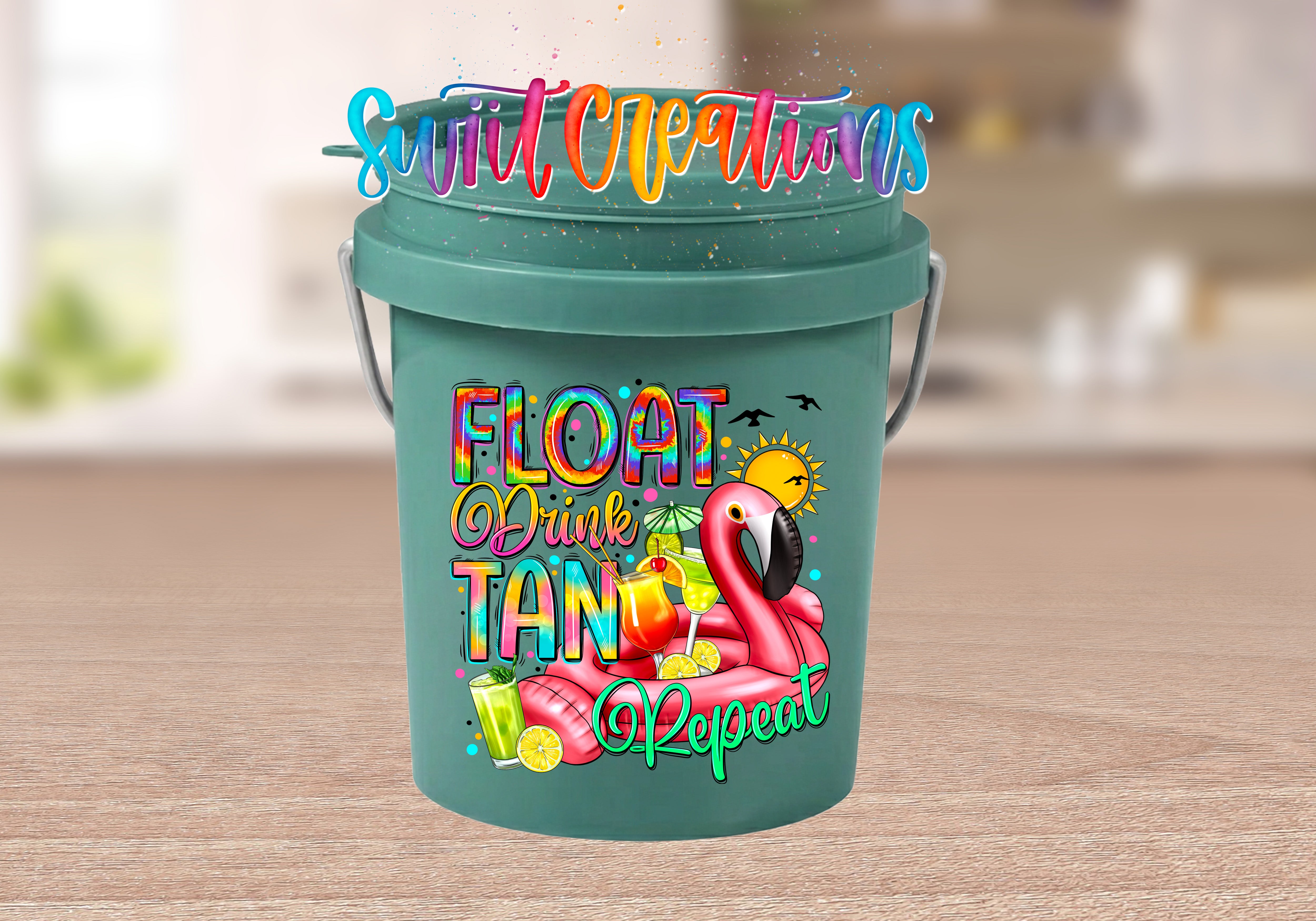 A green bucket with a colorful design featuring a flamingo, a sun, and various summer-themed elements.