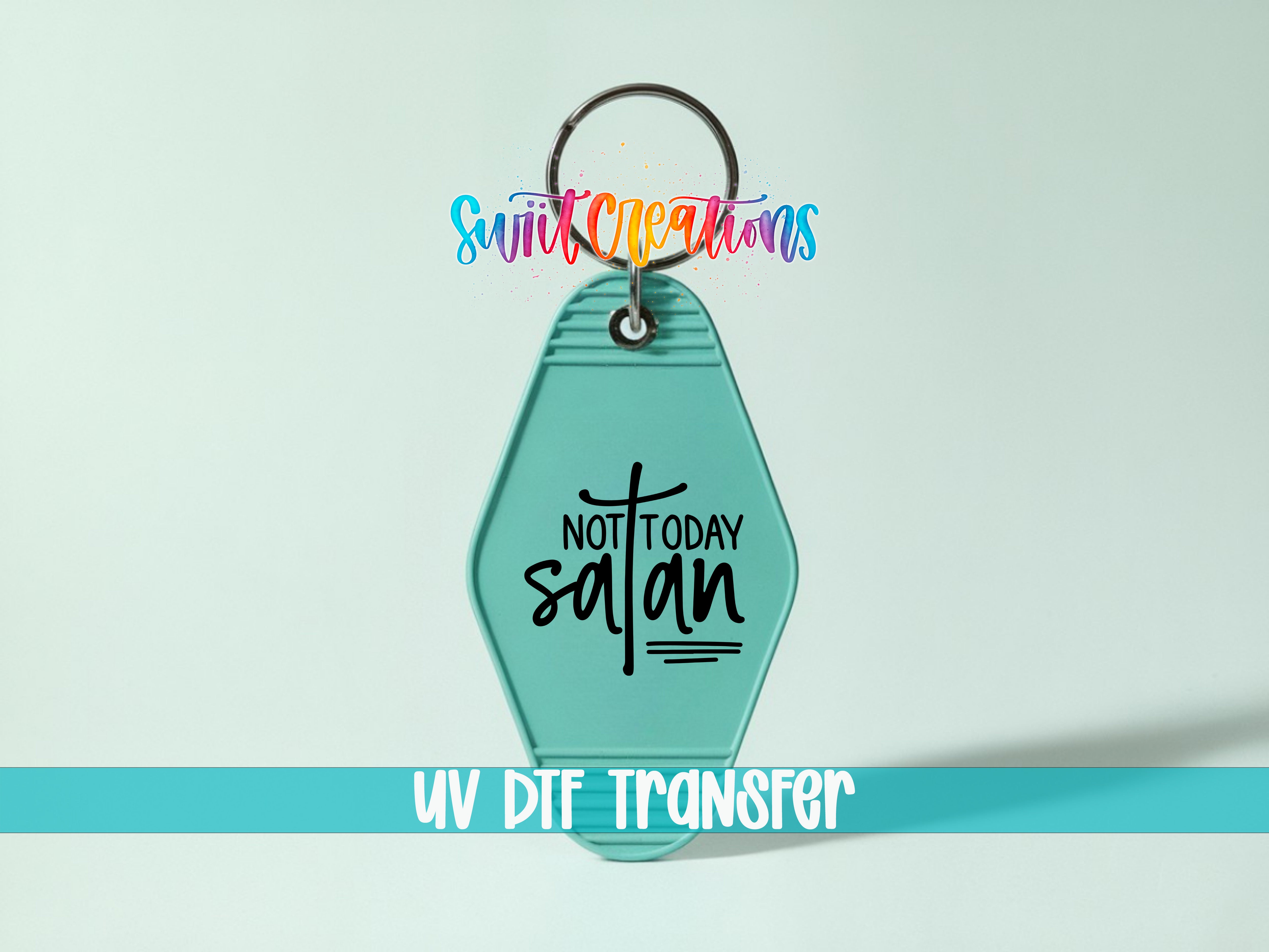 A keychain with a message printed on it, against a light blue background.