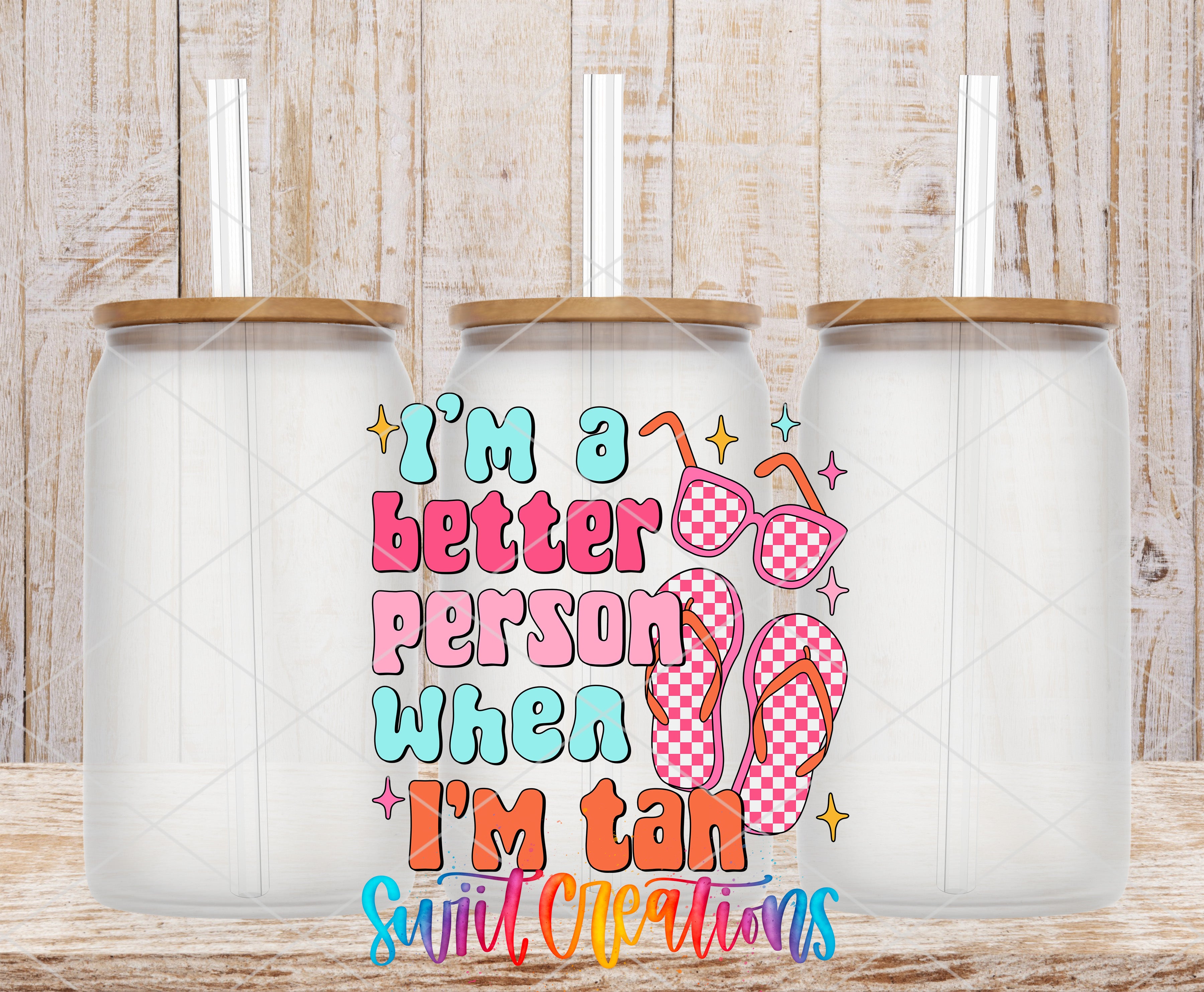 three glass jars with lids, each containing a straw, and there is a colorful text overlay in the center that reads "I'm a better person when I'm tan".