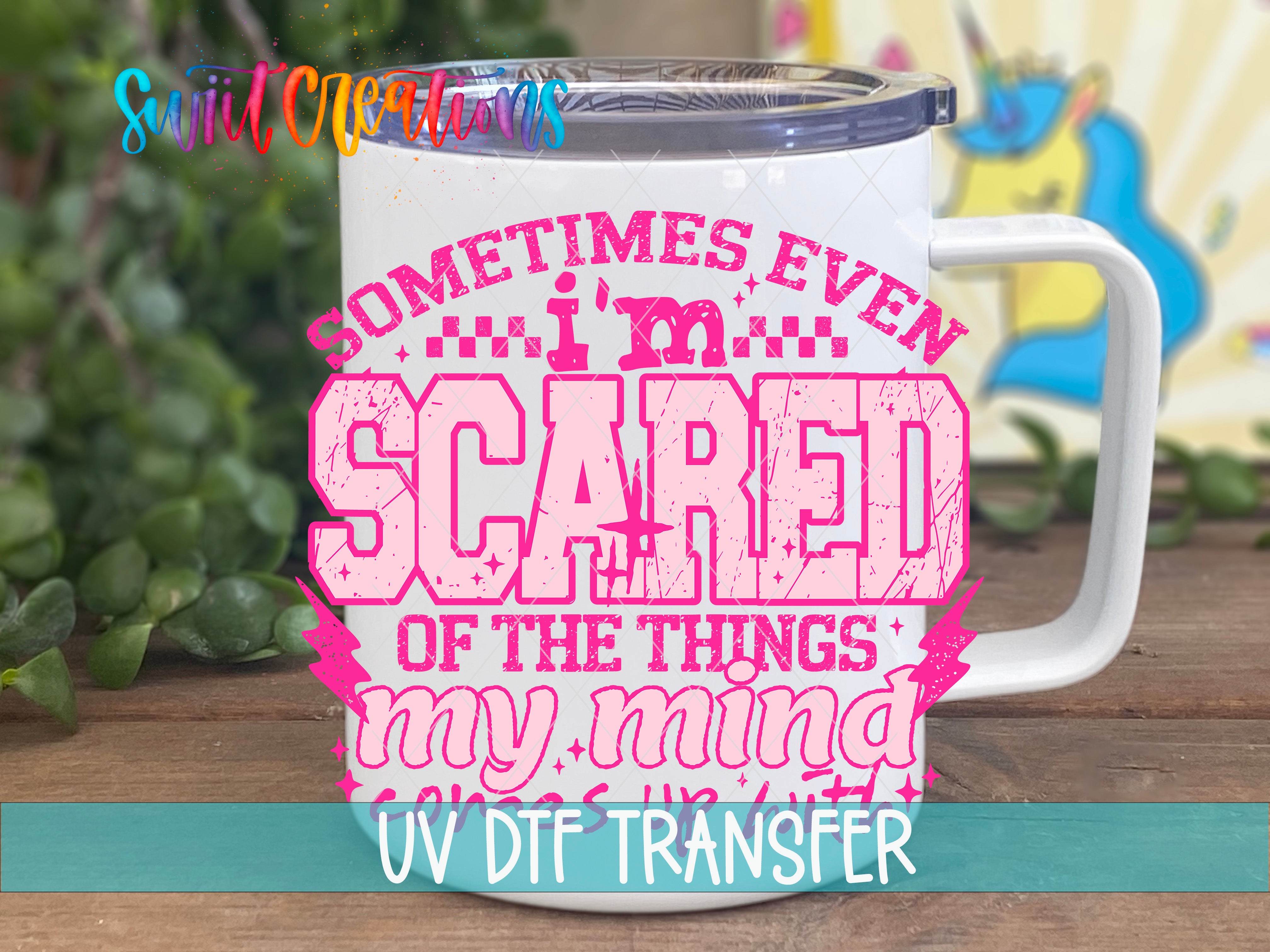 A white mug with a printed design on it, featuring text that says "Sometimes even scared of the things my mind will let go".