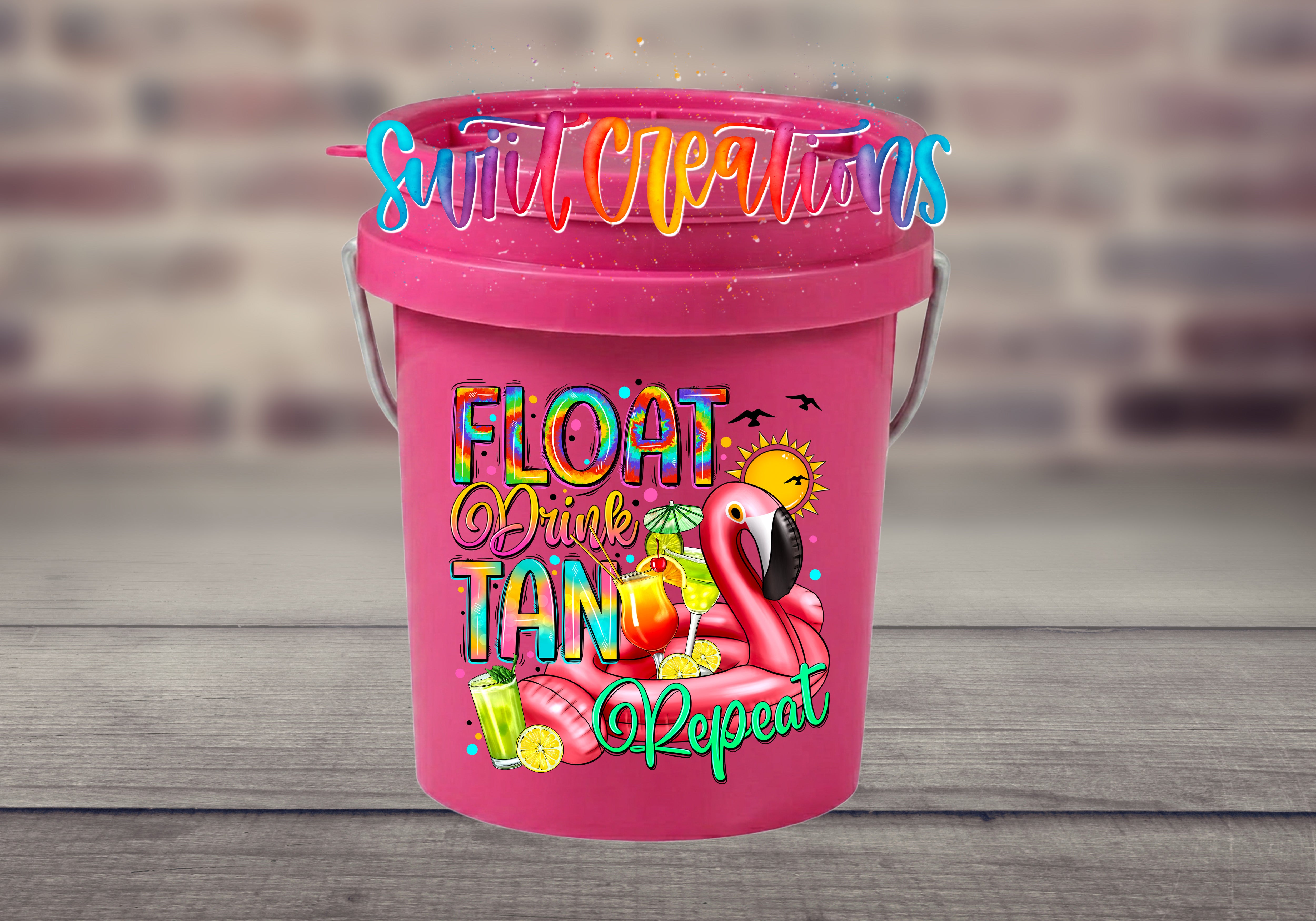A pink bucket with a colorful design featuring a flamingo, a sun, and various summer-themed elements.