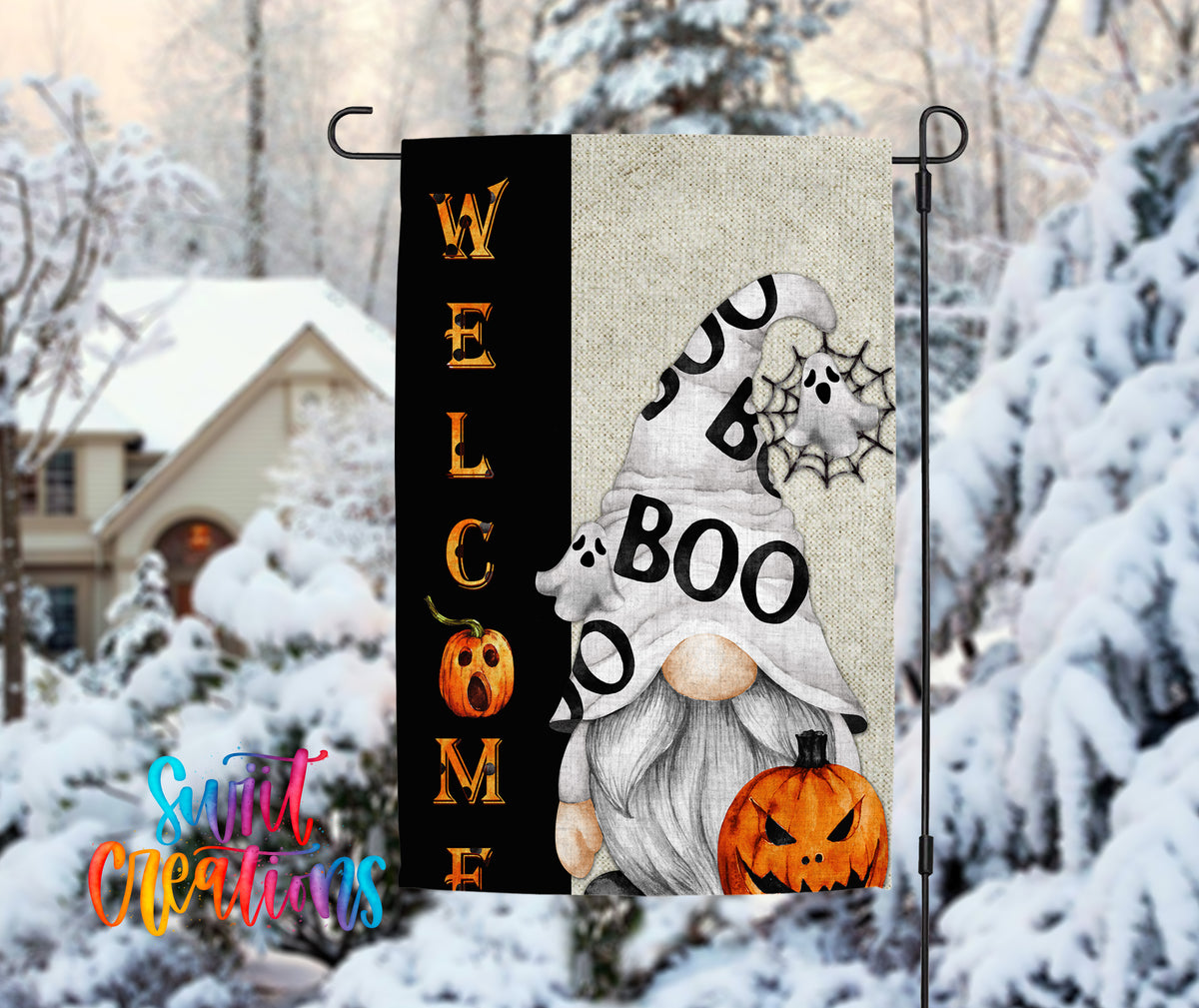 A Halloween-themed welcome sign featuring a gnome, a pumpkin, and a spider web, with the word "BOO" prominently displayed.