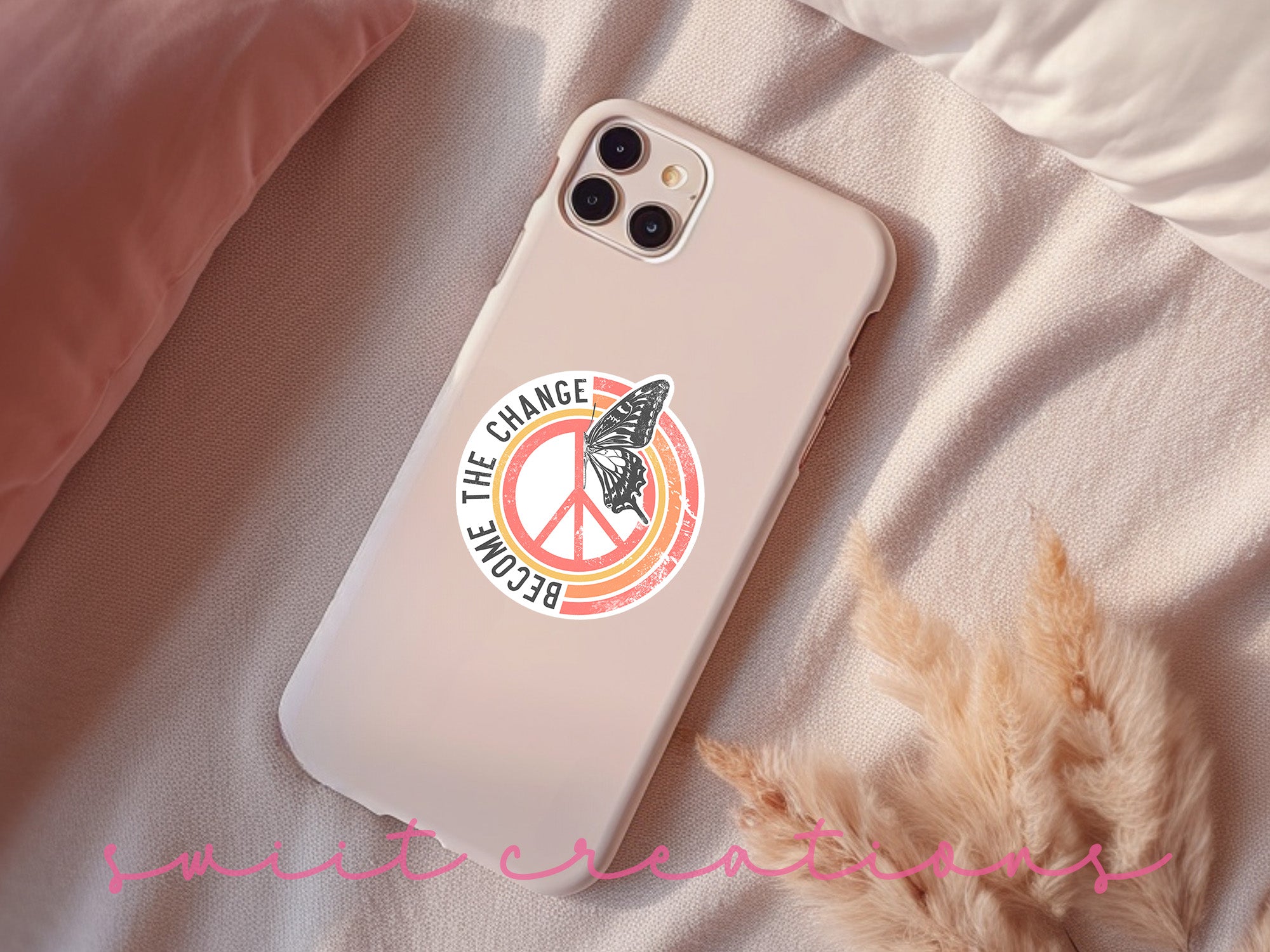 a phone case sitting on top of a bed